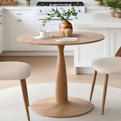 Round pedestal dining table with gloss finish tabletop