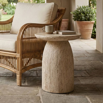 Pedestal end table with travertine-effect finish