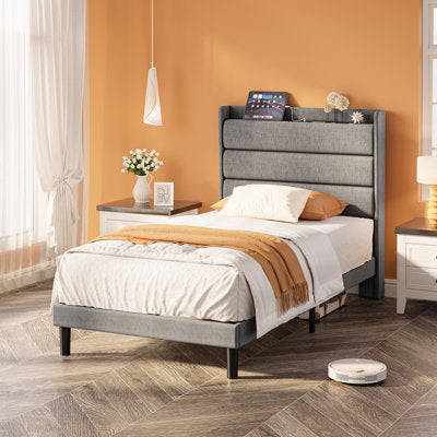 Klementyna Twin XL Upholstered Storage Bed with Power Outlets in a bedroom setting