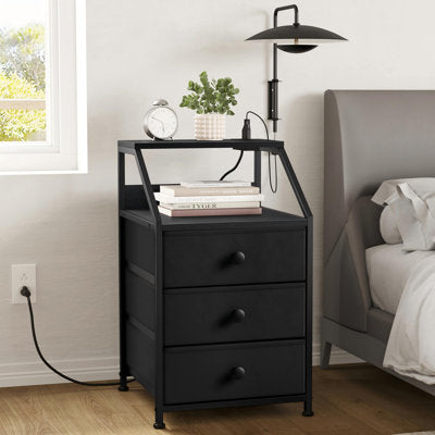 Black nightstand with three drawers, open metal frame and built-in USB ports